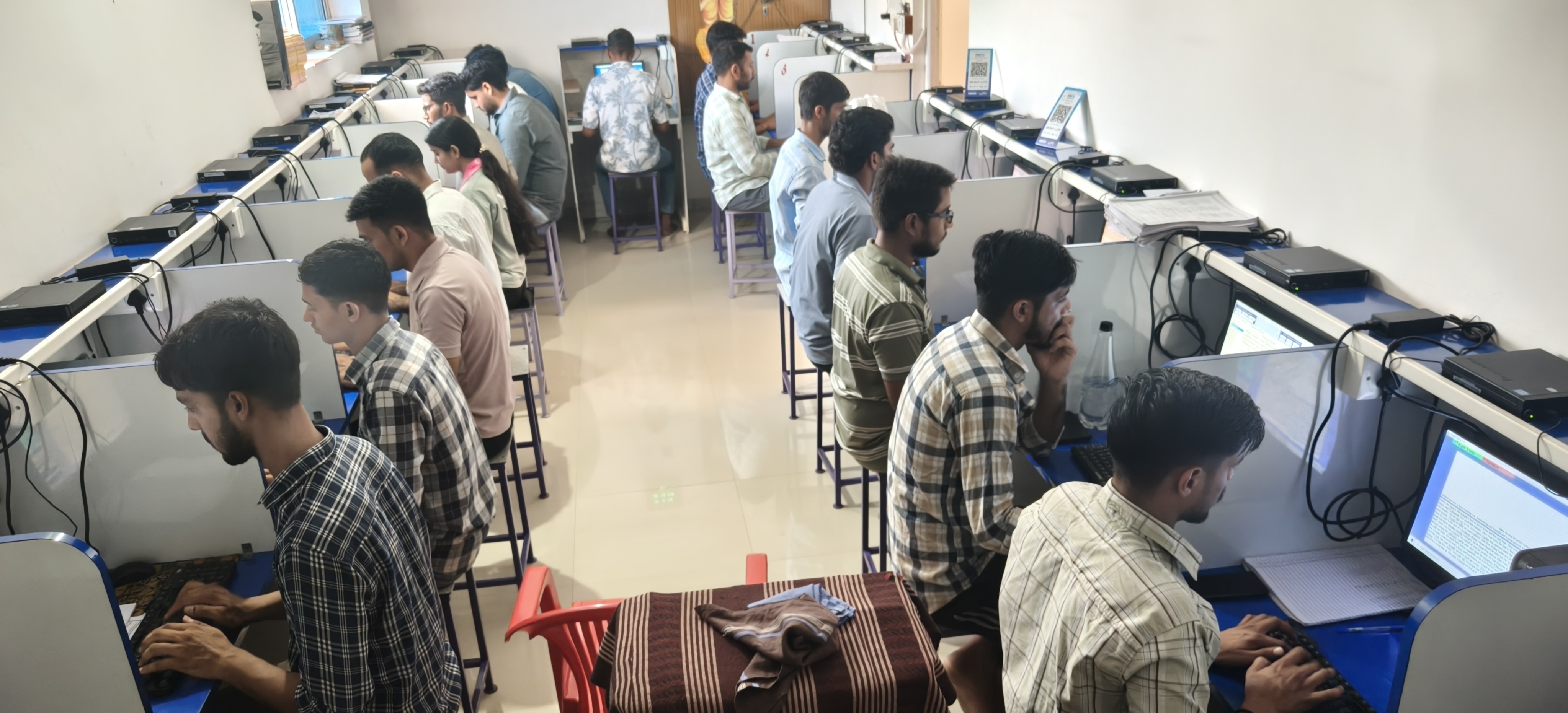 Students practicing typing inside classroom